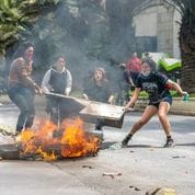 Protestors start fire in street