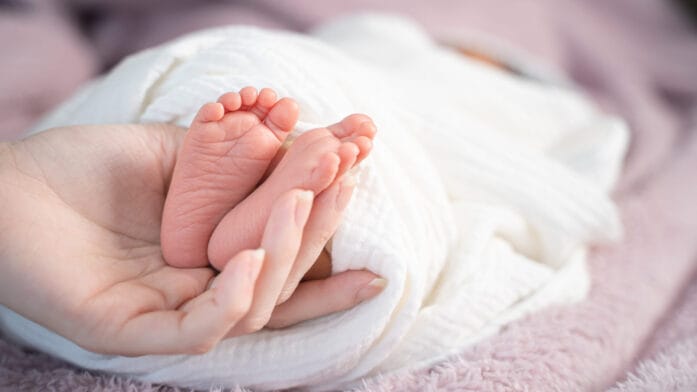 Thumbnail image of Close,Up,Asian,Woman,Mother,Hand,Holding,Small,Baby,Infant