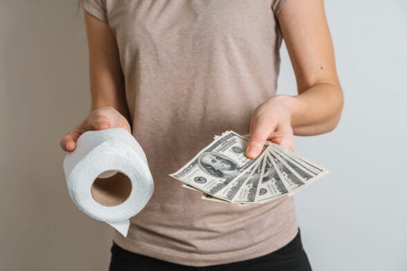Thumbnail image of Cash and toilet paper