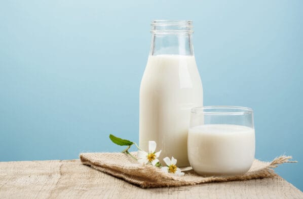 Thumbnail image of A,Bottle,Of,Milk,And,Glass,Of,Milk,On,A