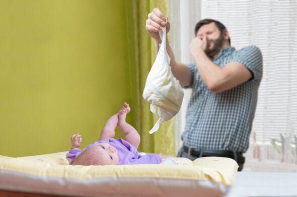 Thumbnail image of Baby,Care,Concept.,Father,Od,Dad,Is,Changing,Stinky,Diaper.