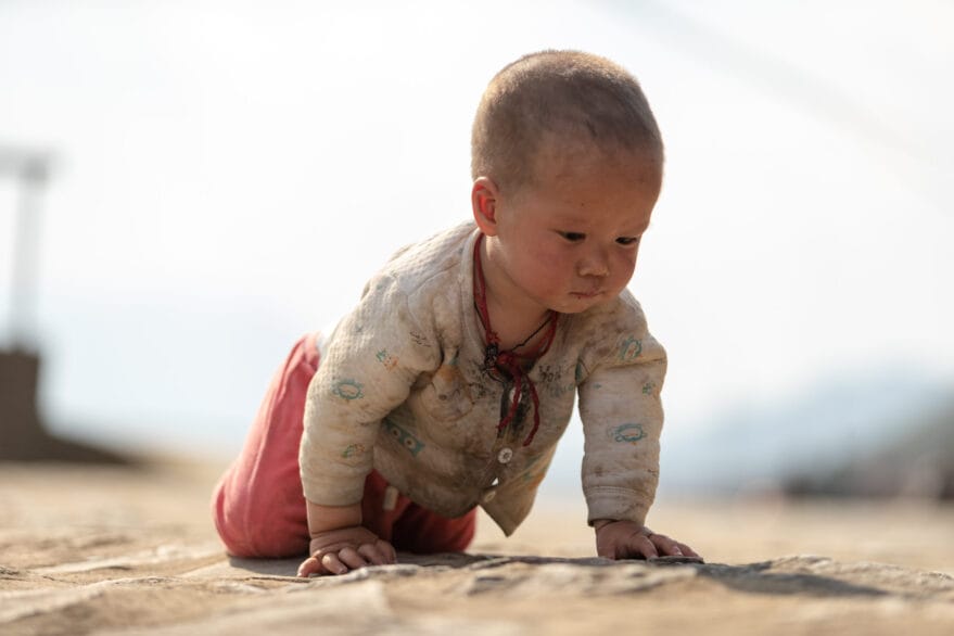 Baby crawling after a disaster