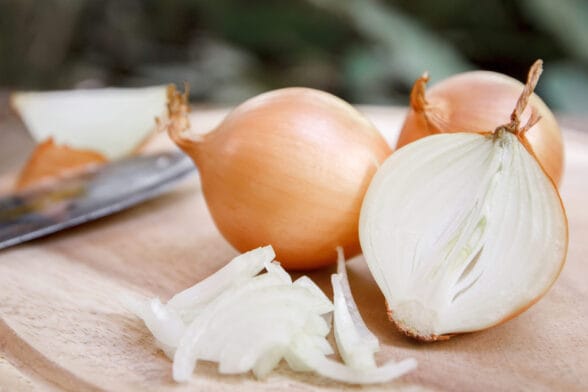 Thumbnail image of Onion,And,Slices,On,Wooden,Cutting,Board.