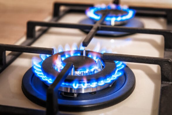 Thumbnail image of Closeup,Shot,Of,Blue,Fire,From,Domestic,Kitchen,Stove,Top.